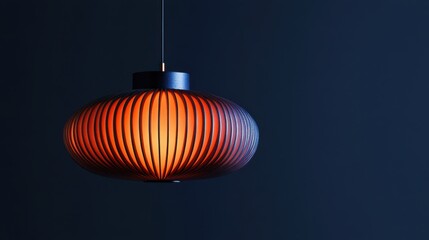 Modern Hanging Pendant Lamp with Striped Shade and Warm Glow in Dark Setting