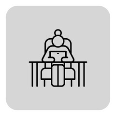 Senior woman focused on digital tablet while seated at modern desk. Productivity and professionalism concept