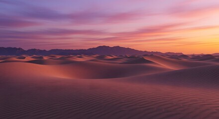 Fototapeta premium Majestic Desert Landscape with Rolling Sand Dunes and a Colorful Sunset Sky Evoking a Sense of Tranquility and Adventure