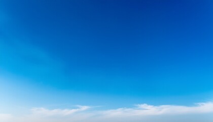 Fototapeta premium the sky is blue and clear with a few clouds scattered throughout