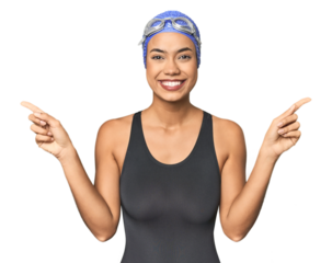 Pro Latina swimmer in studio gear pointing to different copy spaces, choosing one of them, showing with finger.