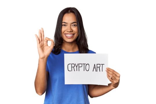 Woman with "crypto art" sign in studio cheerful and confident showing ok gesture.