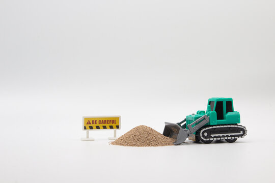 Juguetes trabajadores - Pala verde cargando arena
