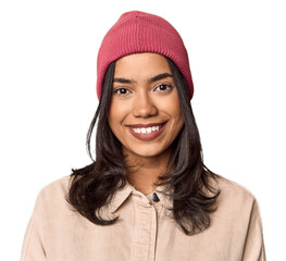 Laughing young Filipino woman with wool hat