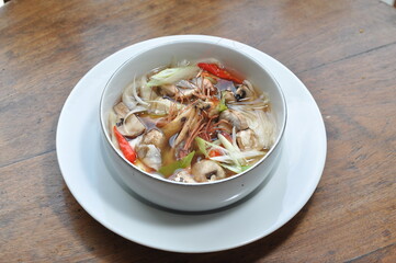 Dive into a vibrant bowl of shrimp soup, brimming with fresh prawns, mushrooms, and aromatic herbs....