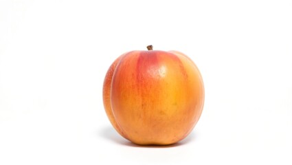 High-res close-up of a ripe peach against a white background. Vibrant red, orange, and yellow hues with subtle fuzz and soft shadow, highlighting its natural beauty.









