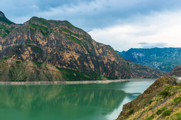 Picturesque landscape with mountain lake and layered beautiful mountains of the North Caucasus Dagestan Russia
