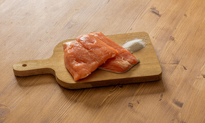 Salmon Fillets on Chopping Board