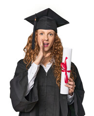 Graduate redhead with diploma is saying a secret hot braking news and looking aside