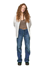 Full-body redhead portrait happy, smiling and cheerful.