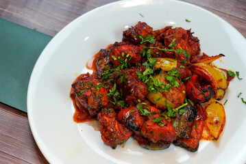Delicious Spicy Chicken Tikka Masala with Onions and Peppers
