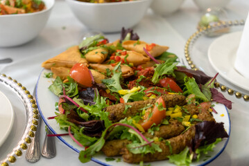 Delicious Indian Starter Platter with Samosas and Kebabs
