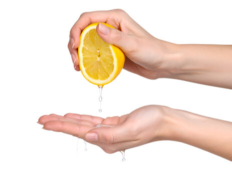 Hand squeezing lemon juice into palm. Transparent background - Powered by Adobe