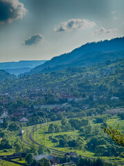 Obraz premium Scenic View of the Carpathian Mountains Covered by Clouds on a Sunny Day