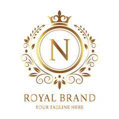 Company vector logo design N with gold star symbol for business celebration