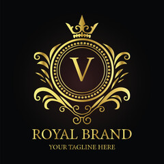 Golden shield vector emblem with crown and ribbon, a vintage award design element LOGO V