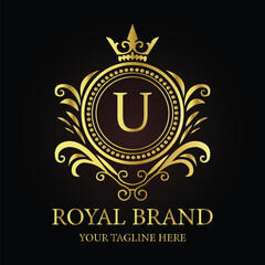 Golden shield vector emblem with crown and ribbon, a vintage award design element LOGO U