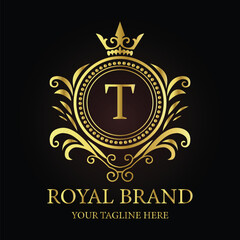 Golden shield vector emblem with crown and ribbon, a vintage award design element LOGO T