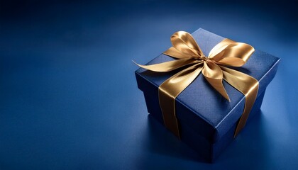 elegant dark blue gift box with gold ribbon luxury presentation concept mystery