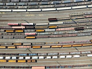 a freight station with many trains - aerial view