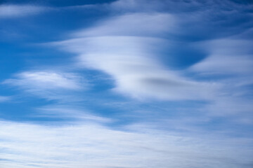 Blue sky with flow cloud like a wing of bird for background.