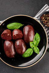 Black pudding sausage fresh delicious gourmet food background on the table rustic food top view copy space