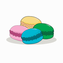macaroons of different colors on a white background