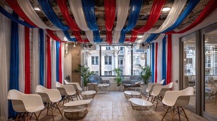 Patriotic event space with red, white, and blue ceiling drapery and modern seating setup, designed for cultural celebrations or themed corporate events