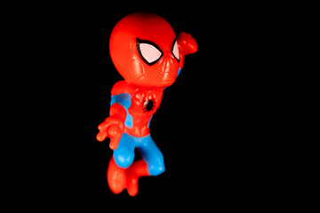 Naklejka premium Kinder Surprise Marvel Spider-Man in a fighting position releases a web and strikes in a jump