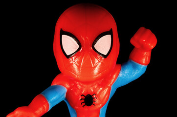 Naklejka premium Kinder Surprise Marvel Spider-Man face on a black background