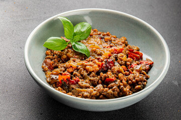 Lentil dish vegetables and roasted peppers savory vegetable fresh vegetarian and vegan food gourmet food background on the table rustic food top view copy space keto and paleo diet