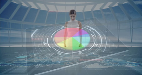 Analyzing woman in sleeveless top reviewing holographic pie chart in control room, with world map