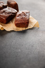 Financier biscuit chocolate cookie sweet dessert fresh delicious gourmet food background on the table rustic food top view copy space
