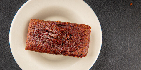 Financier biscuit chocolate cookie sweet dessert fresh delicious gourmet food background on the table rustic food top view copy space