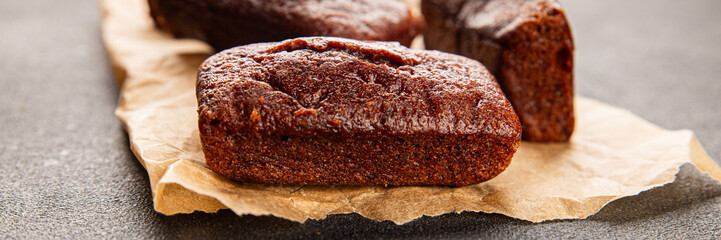 Financier biscuit chocolate cookie sweet dessert fresh delicious gourmet food background on the table rustic food top view copy space