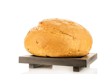 Loaf of white wheat bread, close-up, isolated on white background.