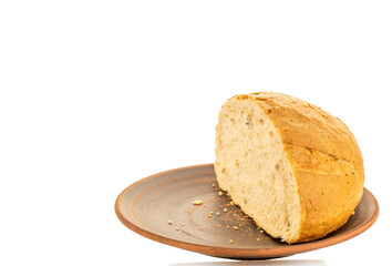 Loaf of white wheat bread, close-up, isolated on white background.