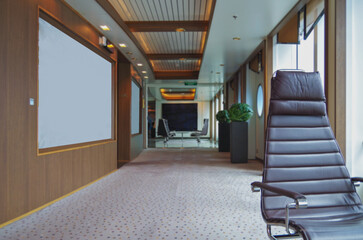 Luxurious modern observation or panorama lounge with floor to ceiling windows onboard expedition...
