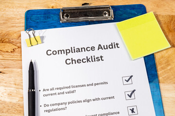 Compliance Audit Checklist Paper with Pen on Desk – Regulatory Inspection Scene