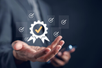 Guarantee and quality standard concept with checkmark icon in hand. Represents business trust,...