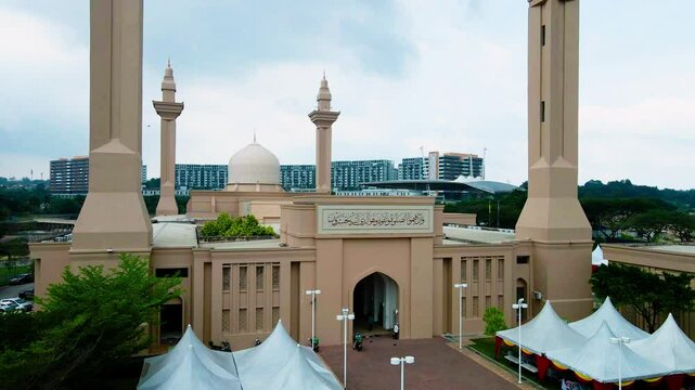 Shah Alam, Selangor, Malaysia - &lrm;March 16, 2025 - Aerial view of the majestic Tengku Ampuan Jemaah Mosque, Bukit Jelutong, Malaysia during the afternoon.