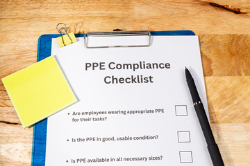 PPE Compliance Checklist Document with Pen on Desk – Workplace Safety and Equipment Regulation...
