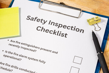 Workplace Safety Inspection Checklist Form with Pen on Desk – Occupational Safety Compliance...