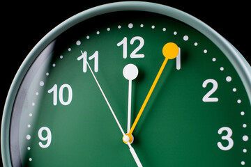 Clocks tell the time of work and life, processes and rules of limited time. Photo of clock in studio.