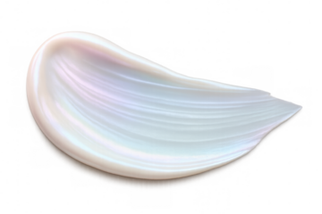 Pearlescent makeup brush stroke with creamy, soft texture creating smooth, blended cosmetic effect against transparent background