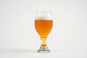 Glass of beer with white foamy head against a clean white backdrop