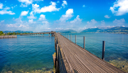 The longest wooden bridge in Switzerland, Holzbrücke Rapperswil-Hurden, spanning the narrowest and shallowest part of Lake Zurich.