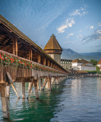 The world famous Kappelbrücke (Chapel Bridge) and its Wasserturm (water tower), Luzern (Lucerne), Switzerland
