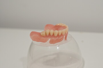 A set of dental dentures on white background