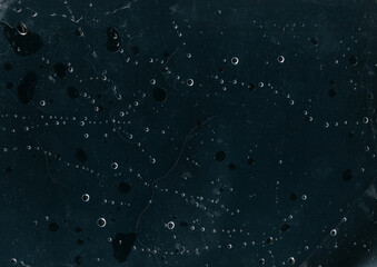 Drop stain. Wet screen. Blue dust scratches bubbles defect weathered used foil surface dark grunge...